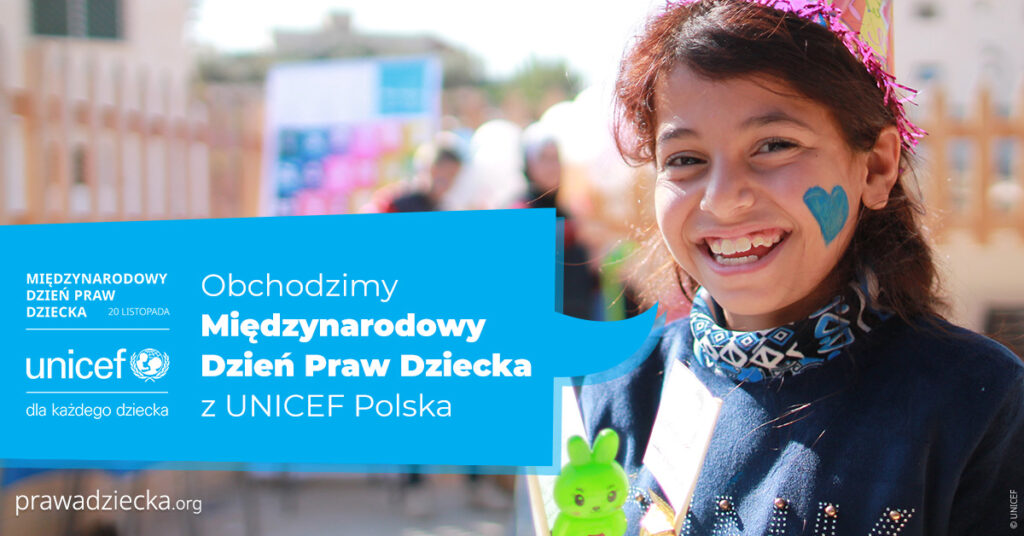 Zdjęcie przedstawia plakat na temat 
Międzynarodowego Dnia Praw dziecka. Na plakacie log UNICEF i uśmiechnięta dziewczynka z narysowanym niebieskim serduszkiem na lewym policzku.  