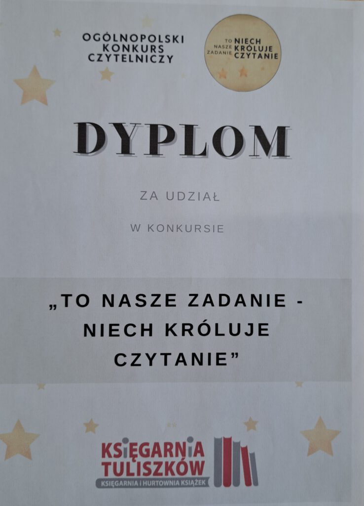 rzedstawia dyplom za udział w konkursie czytelniczym. Tło dyplomu to złote gwiazdki. W dole dyplomu książki szaro-czerwone.