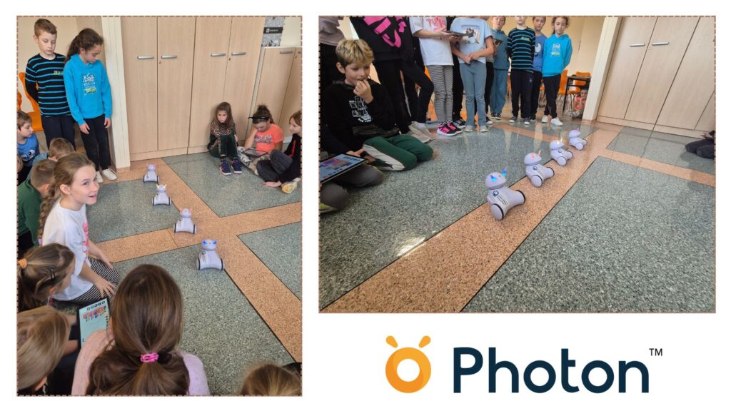 Zajęcia z programowania w klasie trzeciej. Uczniowie klasy 3b synchronizują taniec robotów - roboty tańczą i świecą.