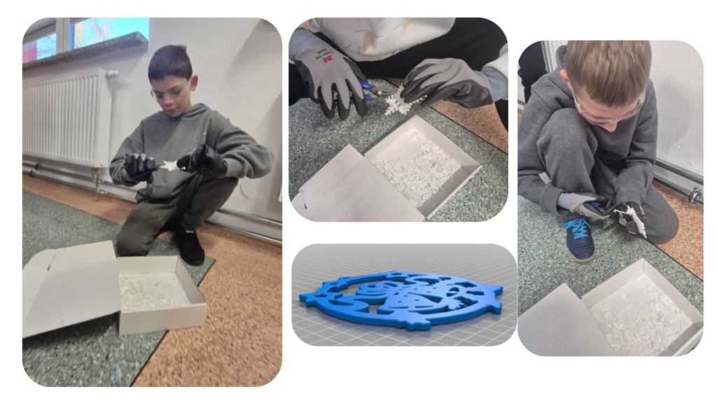 Uczniowie klasy 5a wycinają wydruki obcinaczkami.